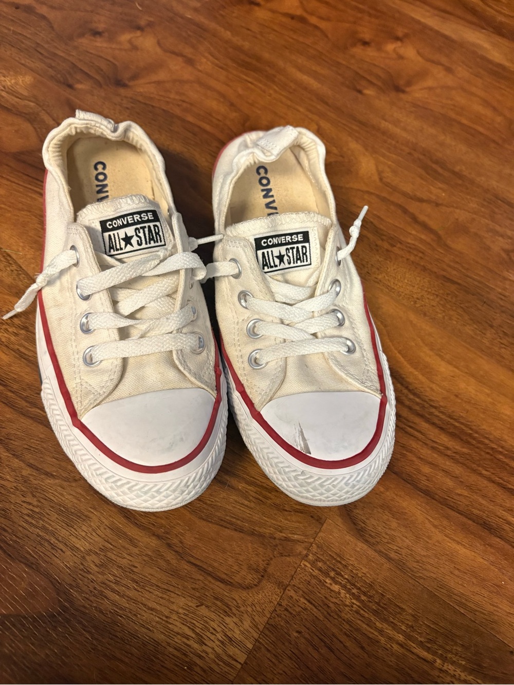 Converse White Low Top Sneakers with Red Stripe